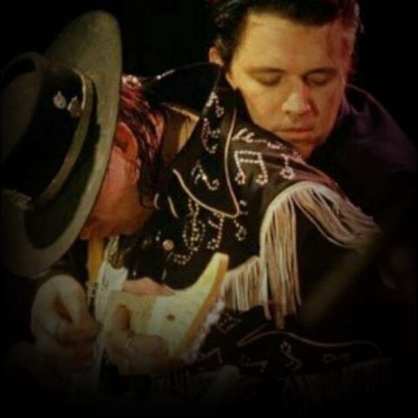 Stevie Ray Vaughan and Jimmie Vaughan performing Rude Mood and Pipeline on a double-neck guitar at the 1987 New Orleans Jazz and Heritage Festival